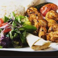 Chicken Shish Kebab  · Specially marinated chicken cubes on skewers. 