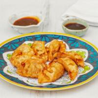 48. Gyoza  · 8 pieces. Pork and vegetables.