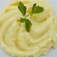 Mashed Potatoes 1 Lb. · Potatoes, Heavy Cream, Unsalted Butter, Garlic Powder, and Salt.