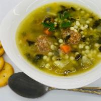 Wedding Soup · Ground Beef, Onion, Celery, Carrot, Spinach, Couscous, Mozzarella  Cheese, Chicken Broth.