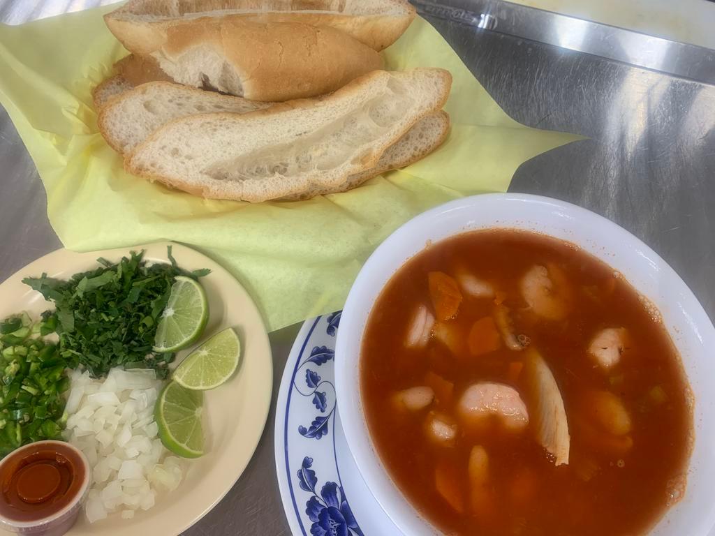 Sopa de Mariscos · Fish, shrimp, and octopus served in caldo.