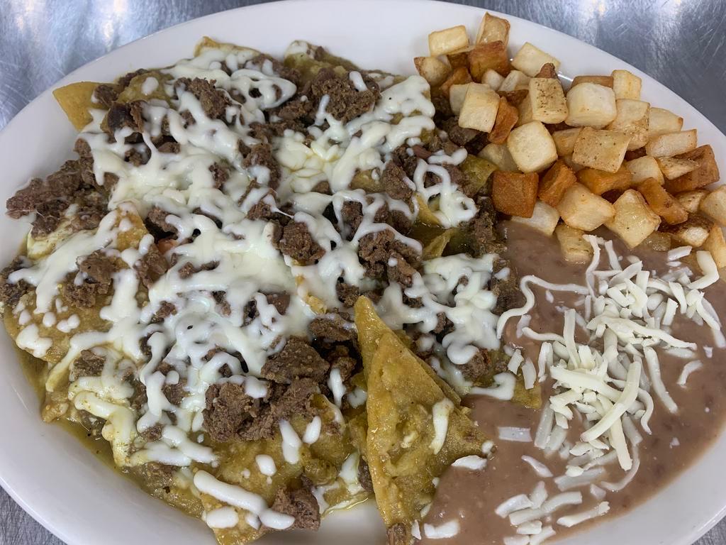 Chilaquiles Beef Plate · Chips soaked in green o house salsa and cheese. Served with potatoes and beans.