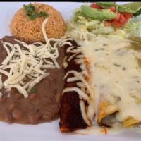 Bandera Enchilada Plate · 4 enchiladas, 2 chicken and 2 ground beef, with green, queso, and red sauce.