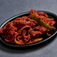 Tandoori Chicken · Spring chicken marinated in yogurt and mild spices roasted in the clay oven. 