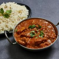 Butter Chicken · Boneless tender chicken cooked with butter gravy.