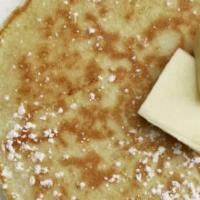 Buttermilk Pillowcakes  · 2 buttermilk pancakes as soft as your pillow served with butter and maple syrup