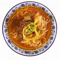 Sauerkraut Beef Noodle Soup 酸菜牛肉面 · Savory light broth with noodles.