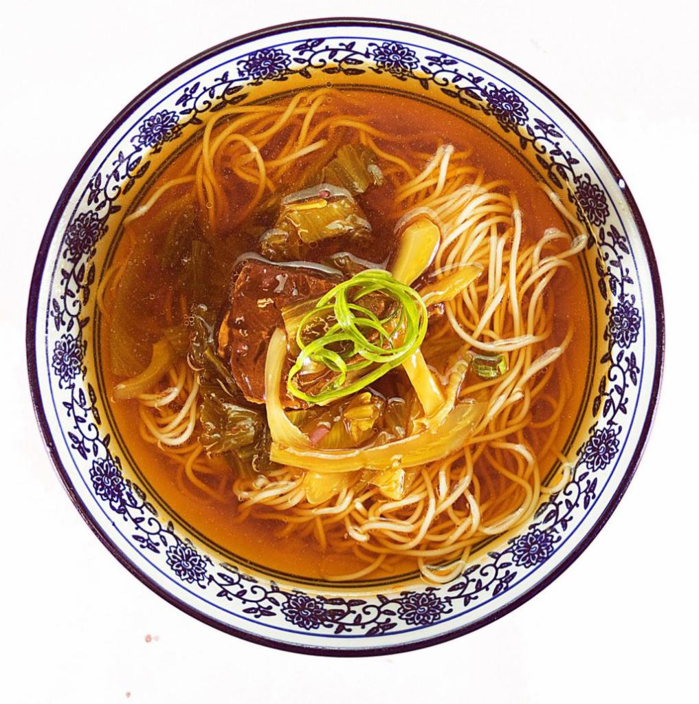 Sauerkraut Beef Noodle Soup 酸菜牛肉面 · Savory light broth with noodles.