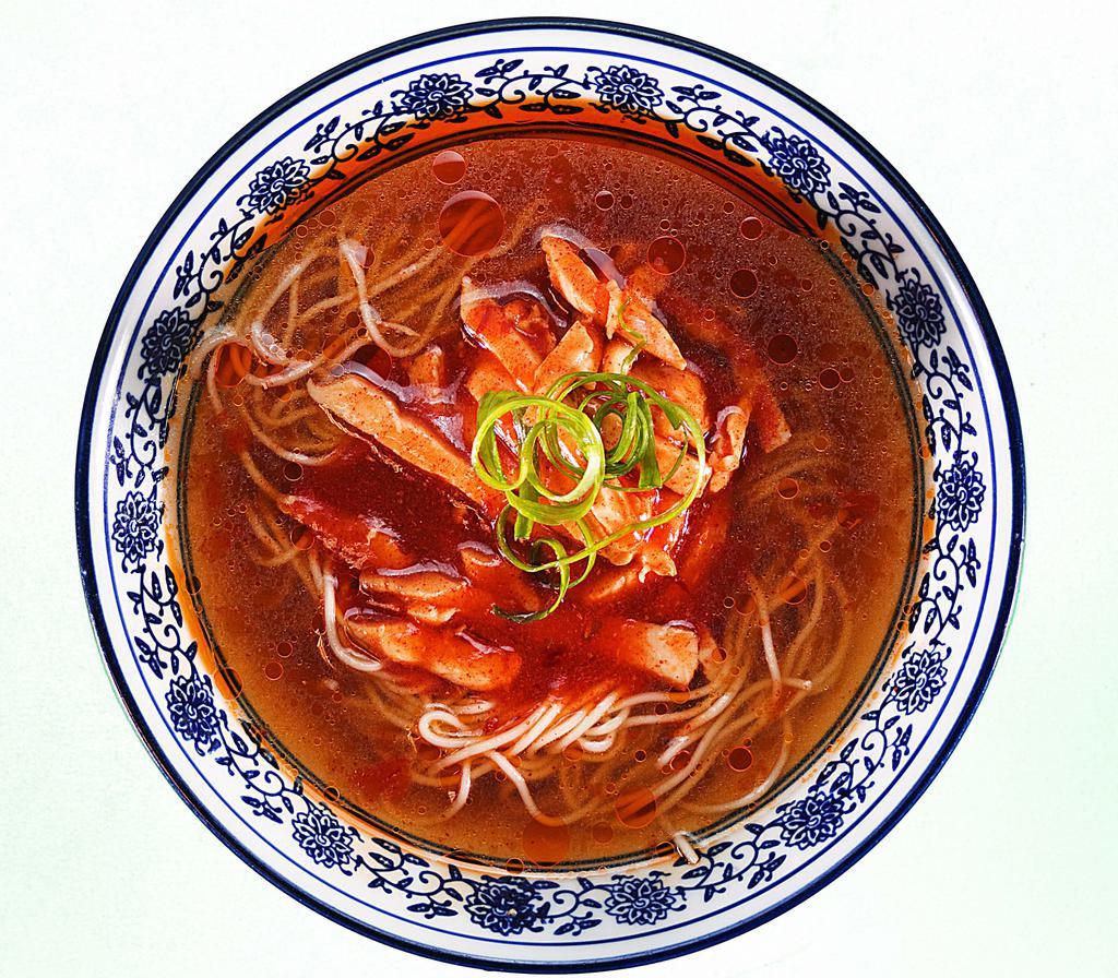 Spicy Chicken Noodle Soup 麻辣鸡丝面 · Savory light broth with noodles.