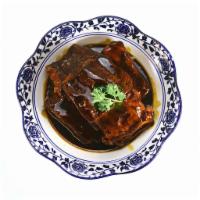 Wuxi Pork Ribs 无锡排骨 · A cut of meat including the rib. 