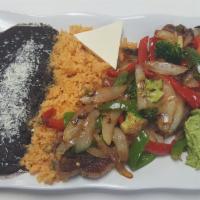 Fajitas Mixtas · Comes with Chicken, Shrimp and Beef
Served with Rices and Beans