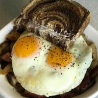 CBH · HOEmade corned beef with HOE fries and topped with queso. Served with two eggs any style and...