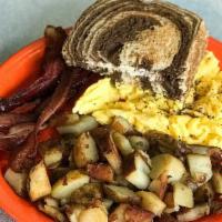 Sloppy Seconds · Two eggs any style served with HOE fries, choice of breakfast meat and toast.