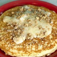 Oatmeal Pie Pancakes Sweets · Two oatmeal pancakes layered with buttercream icing. Served with maple syrup.