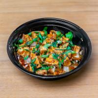Chili Paneer · Fried paneer cubes tossed with bell peppers and onions in chili, soy sauce & Indian spices.