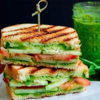 Bombai Toast Chutney Sandwich · An everyday sandwich with green chutney and tomatoes and cucumber.