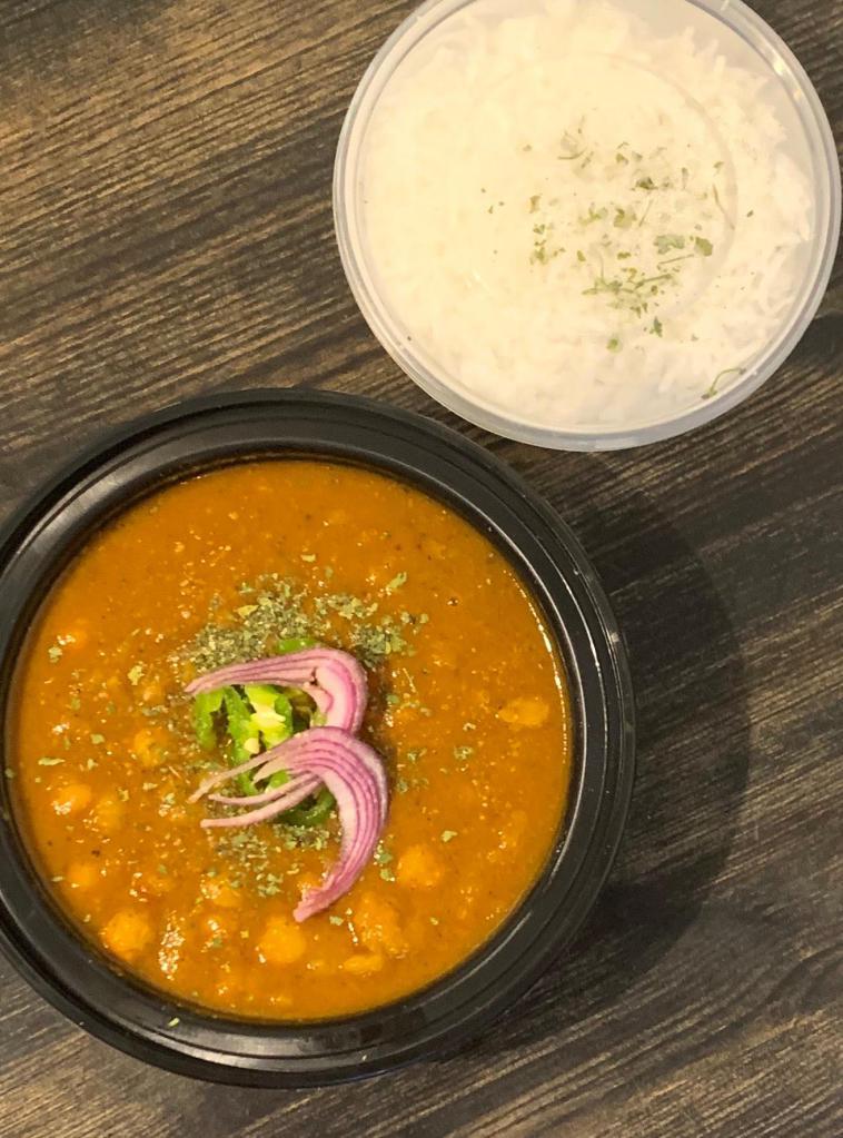 Chana Masala · Slowly cooked chickpeas with tomatoes and onions flavored with house spice served with basmati rice. Vegan. Gluten-free.