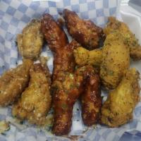 12 Piece Wings · Choice of 2 flavor.