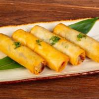 Veggie Thai Egg Roll · Deep fried vegetable egg rolls filled with mixed vegetables and clear vermicelli noodles. Se...