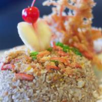 Crabmeat Fried Rice · Wok-fried jasmine rice with blue crab meat, egg and onions, topped with spring onions