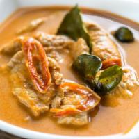 Panang Curry · A delicately spiced curry in a rich coconut milk, peanut butter, bell peppers & green beans.