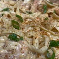 Cajun Pasta  · Rich Alfredo sauce with sauteed shrimp and crawfish tails. 