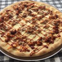 BBQ Chicken Pizza · Mozzarella cheese and fried breaded chicken drizzled in BBQ sauce.