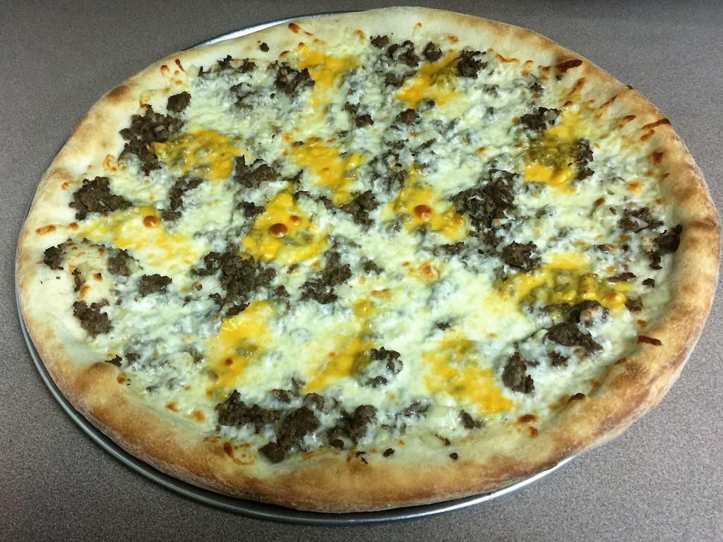 Philly Cheesesteak Pizza · Mozzarella cheese, American cheese, Philly steak and onions.