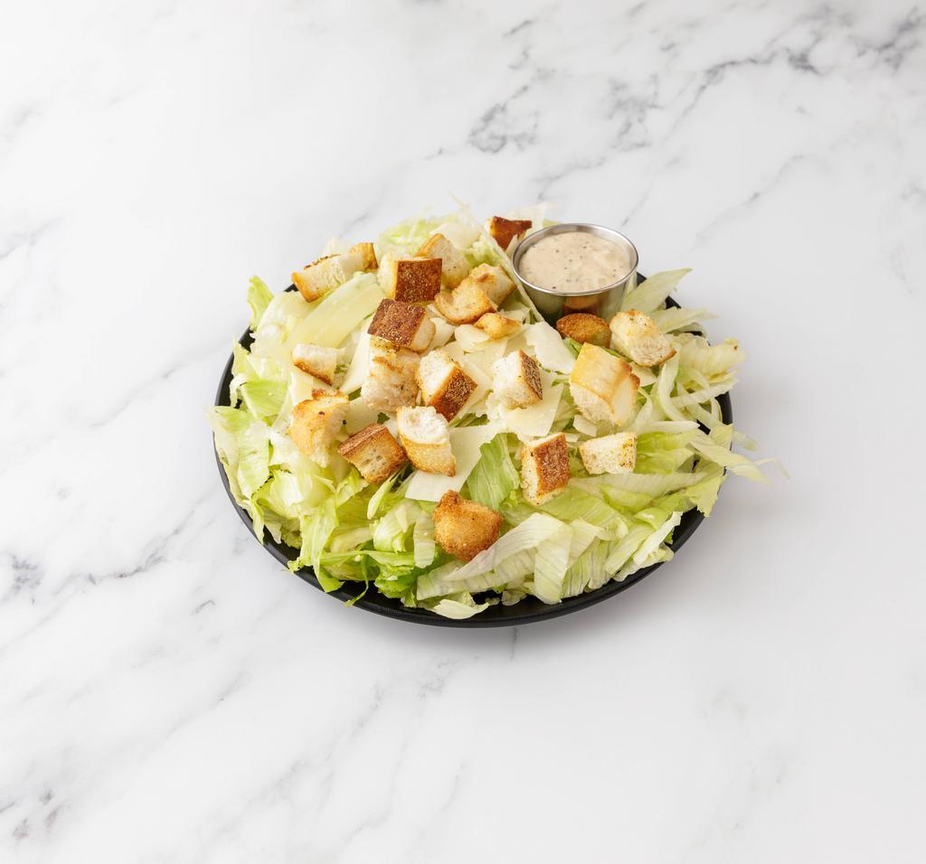 Chicken Caesar Salad · Chicken, lettuce, Parmesan cheese and croutons with Caesar dressing.