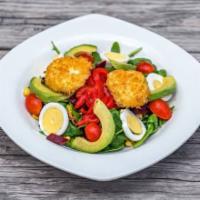 Steamed Beets and Chargrilled Corn Salad · Served over a mixture of california arugula and spinach tossed with avocado, boiled eggs, fr...