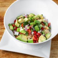Quinoa Energy Bowl · With chickpeas, black beans, corn, cherry tomatoes, sliced red onion , avocado & fresh cilan...