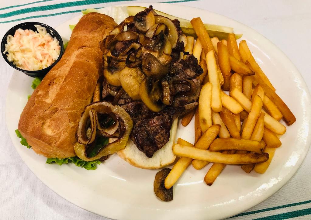 Sliced Sirloin Steak Sandwich · Eight-ounce steak sliced and served over French bread with sauteed onions and mushrooms.