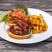 Signature Kettle Burger · Eight-ounce Angus beef with sauteed onions, bacon, roasted red peppers, and chipotle BBQ sau...