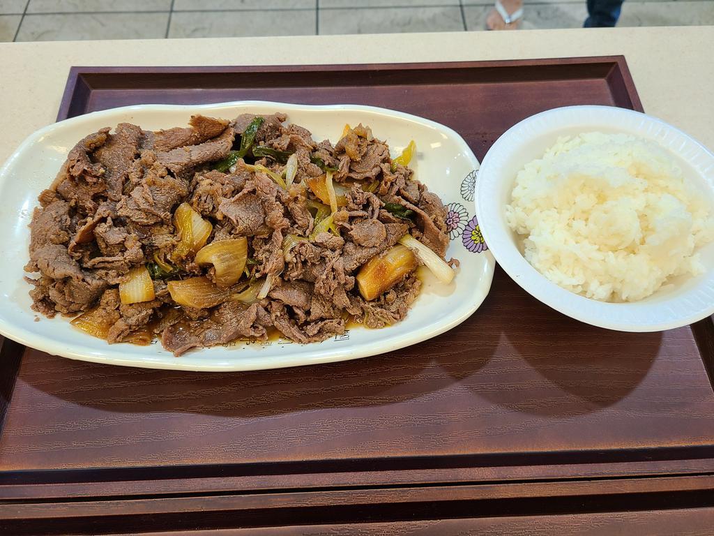 22. Bulgogi(불고기) · Thinly sliced soy beef, veg
(includes 1 bowl rice and 1 side dish)