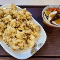 38. Tangsuyuk(탕수육) · Deep fried pork with sweet and sour sauce
(includes 1 bowl rice and 1 side dish)