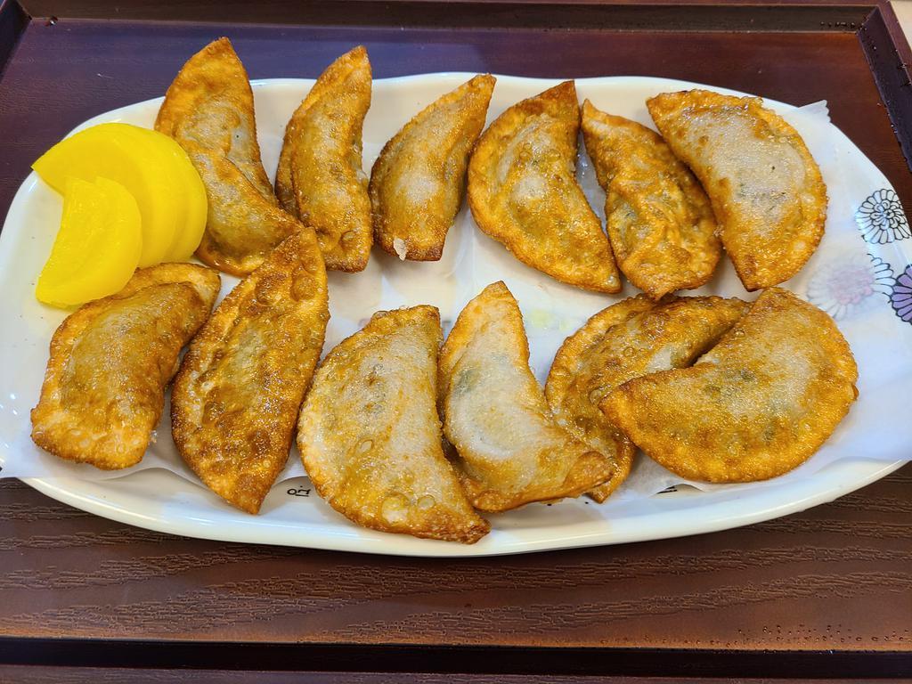 42. Fried dumpling(튀김만두) · Fried dumpling (beef, pork, veg mix together)
(include 1 side dish)