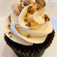 Peanut Butter Cup · Chocolate cake with our signature peanut butter buttercream frosting and peanut butter cup p...
