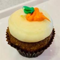 Carrot Cake Cupcake · Carrot cake with our signature cream cheese frosting.