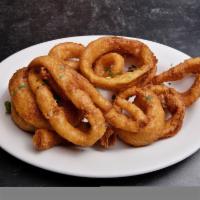 Beer Battered Onion Rings · Fried battered onion.