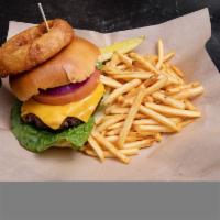 Jack Duggan Classic Burger · A 8 oz. Flame broiled charcoal burger served with hand cut french fries, lettuce, tomato, JD...