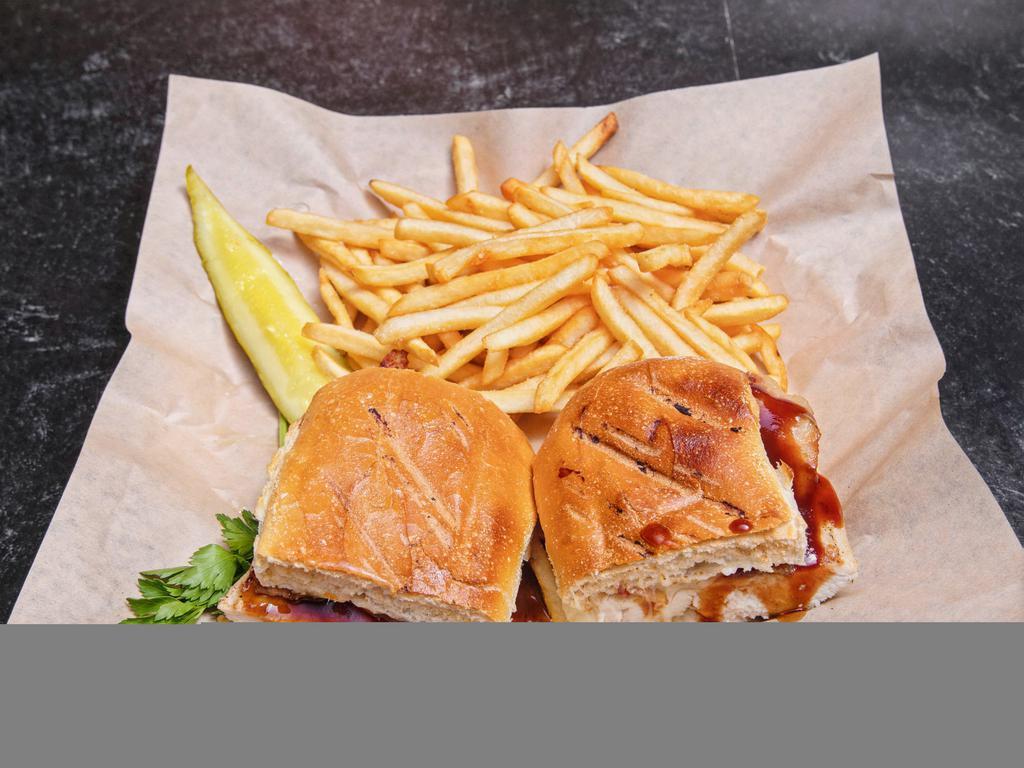 Jennings Chicken Sandwich · Grilled chicken breast served with bacon, BBQ sauce, and melted mozzarella cheese served on a club roll. Comes with hand cut fries, JD coleslaw, and pickle.