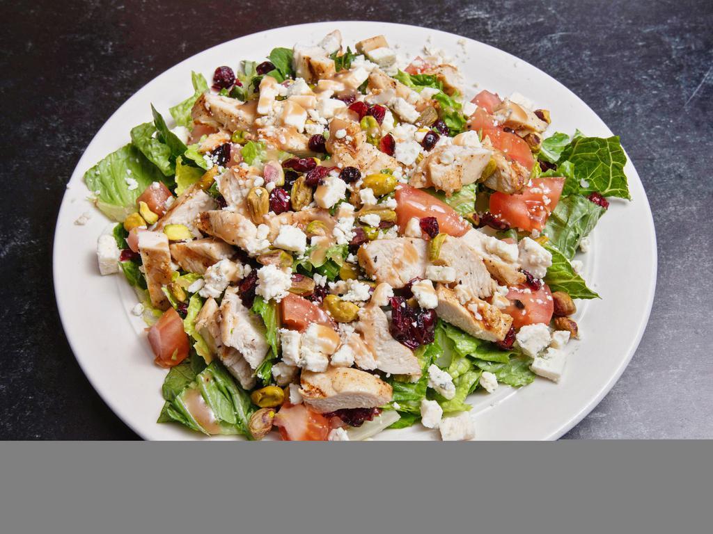 Signature Salad · Grilled Chicken, fresh Gorgonzola cheese, dried cranberries, pistachios, and cherry tomatoes. Served over romaine lettuce with JD balsamic vinaigrette.
