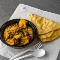 Chicken Curry · Served with rice or roti. Halal. Curry seasoned dish. 