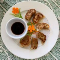 Potstickers · Home made pan fried pork dumplings. Steamed available.