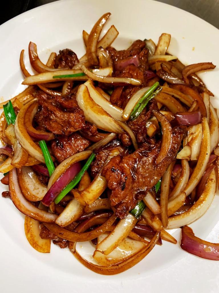 Mongolian Beef Dinner · Stir beef onions, jalapeno, scallions.