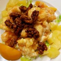 Walnut Shrimp Dinner · Large shrimp and pineapple in a fruit mayonnaise sauce, topped, with crispy honey and sesame...