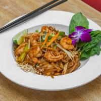 Pad Thai · Stir fried Thai noodle, egg, scallion, bean sprouts and fresh lime, sprinkled with ground pe...