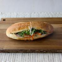 Classic Banh Mi  · All sandwiches come with pate, mayo, butter, cucumber, pickled carrots & daikon radish, and ...