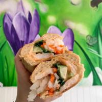 Sauteed Shrimp Banh Mi · All sandwiches come with pate, mayo, butter, cucumber, pickled carrots & daikon radish, and ...