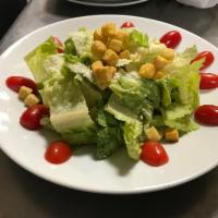 Caesar Salad · Fresh lettuce, bread croutons, Parmesan cheese mixed in special Caesar dressing.